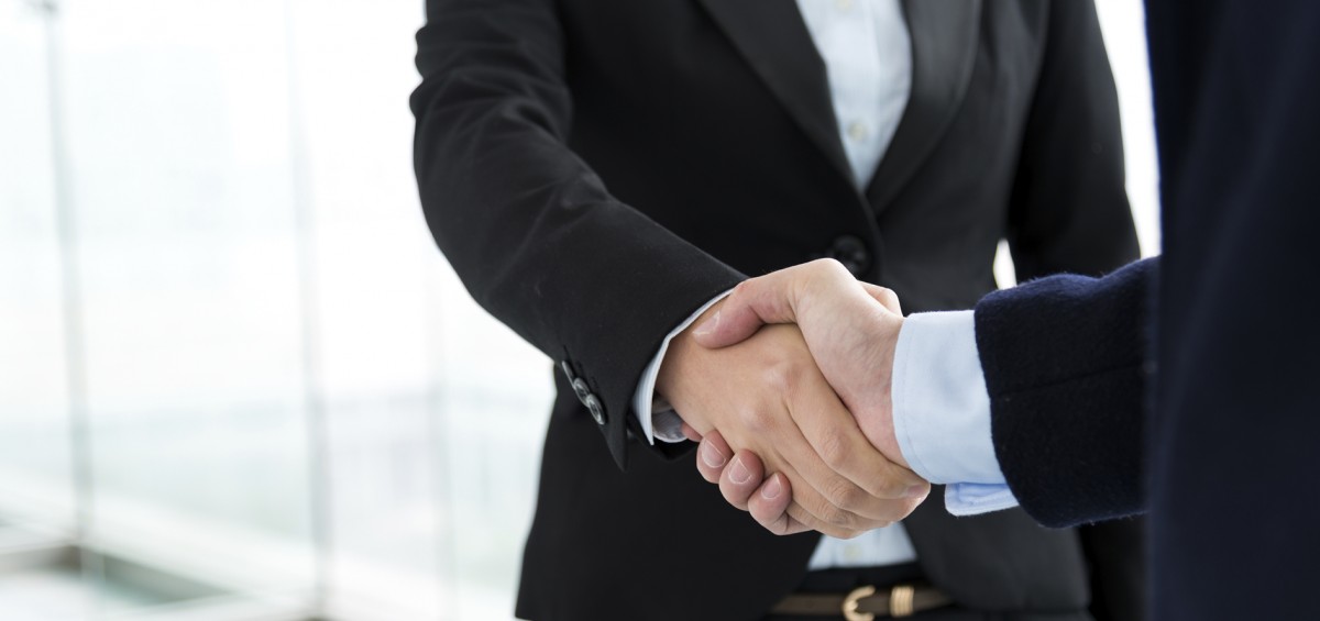 Closeup of business handshake.
